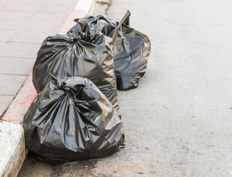 Customer service team assisting with waste removal