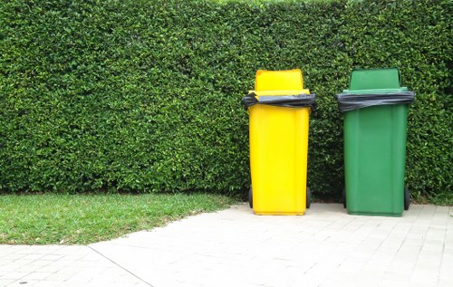 Modern waste clearance vehicles in West London